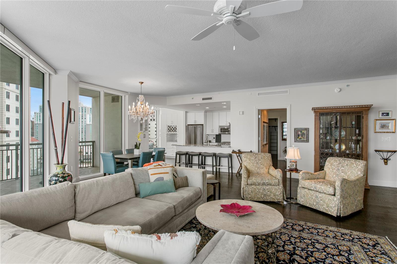 Designed for both comfortable living and effortless entertaining, the expansive open-concept living and dining spaces flow seamlessly into the kitchen