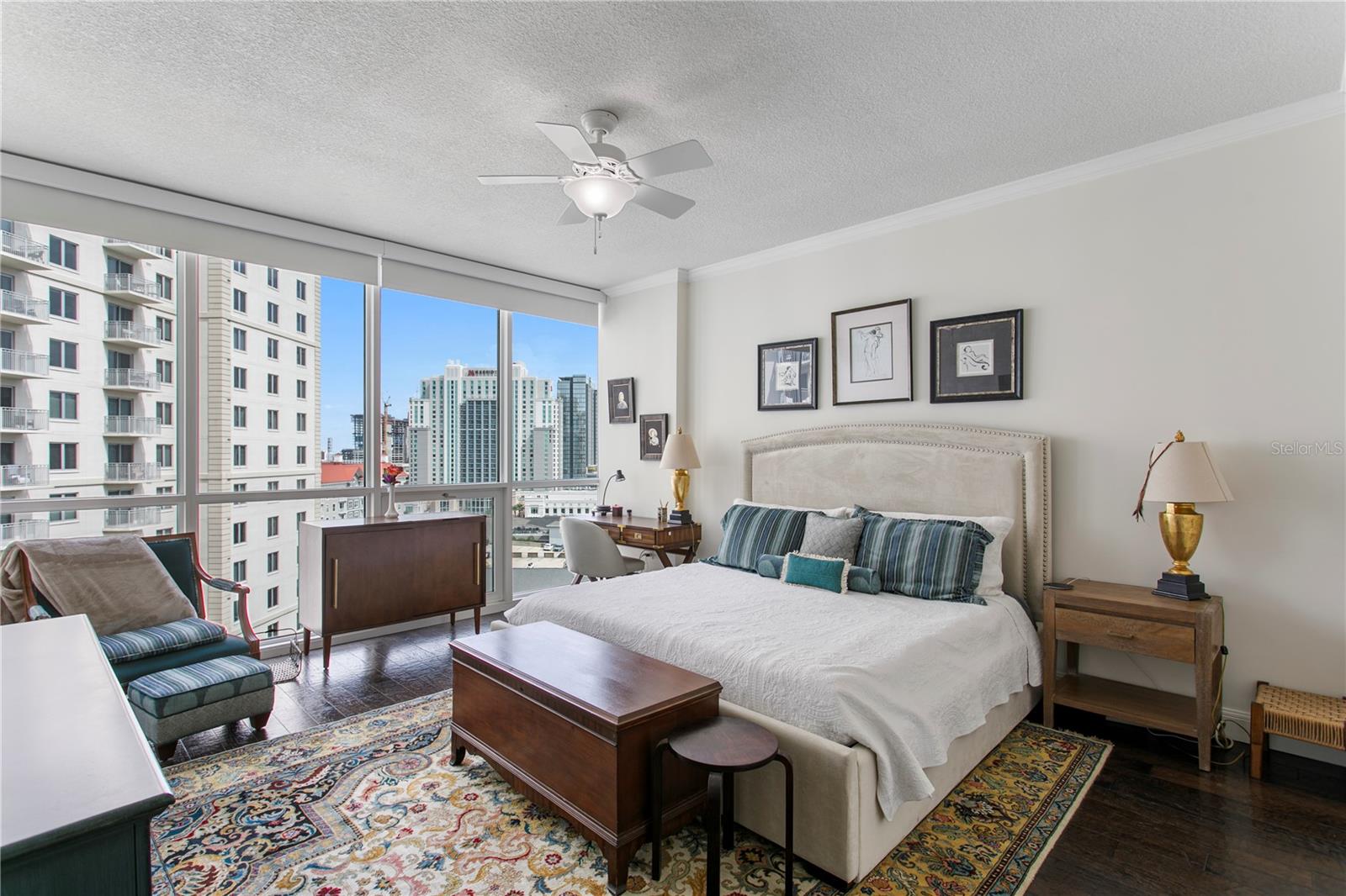 The spacious primary suite serves as a peaceful retreat