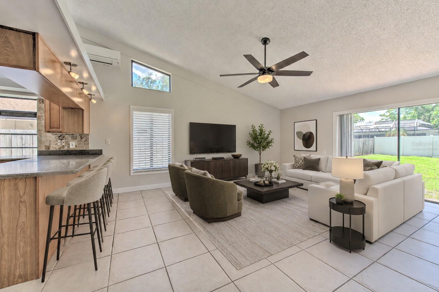 Virtually Staged - Family Room adjacent to Kitchen