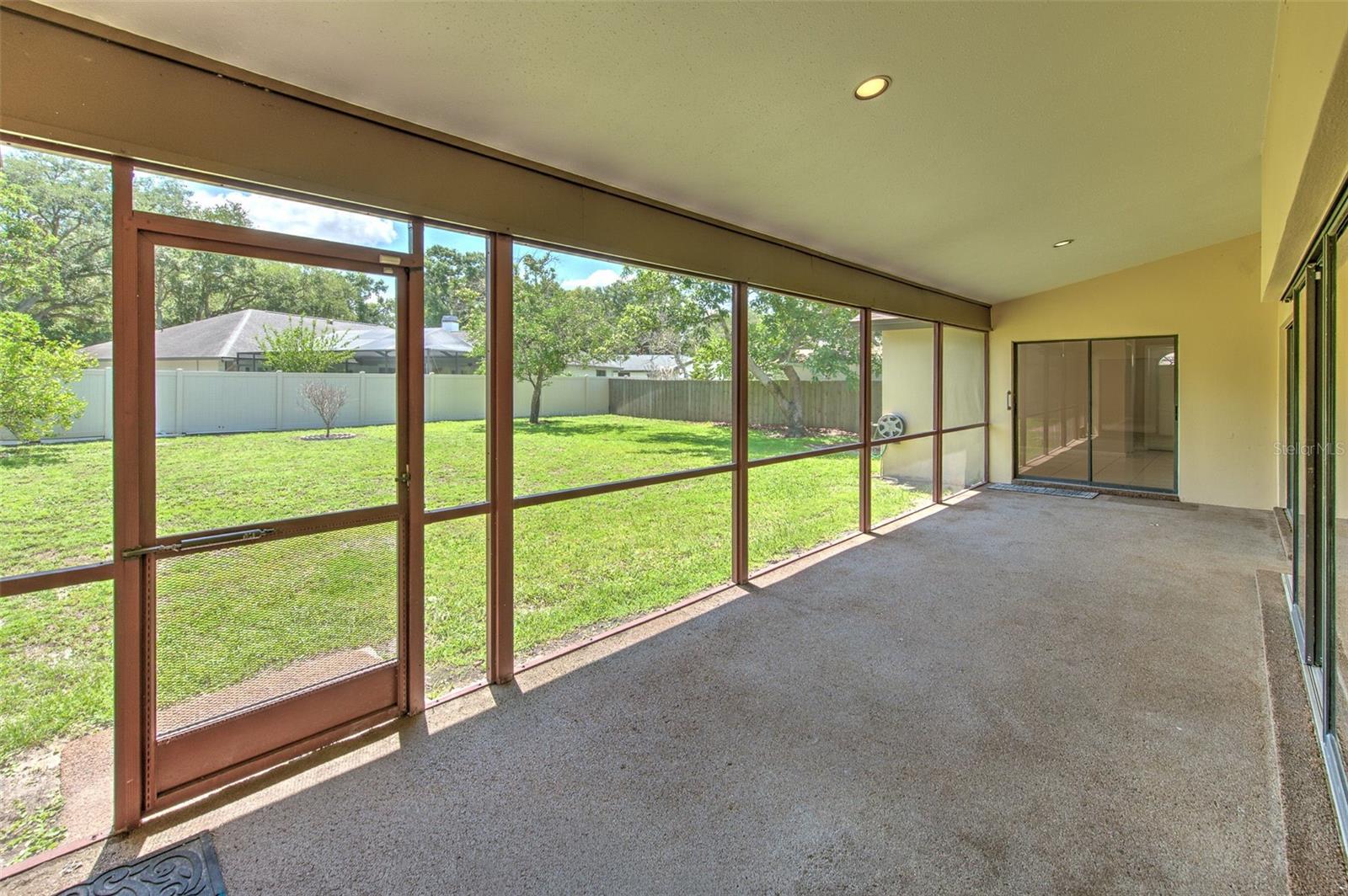 Covered Screened Patio with HUGE backyard with Starfruit & Avocado Tree