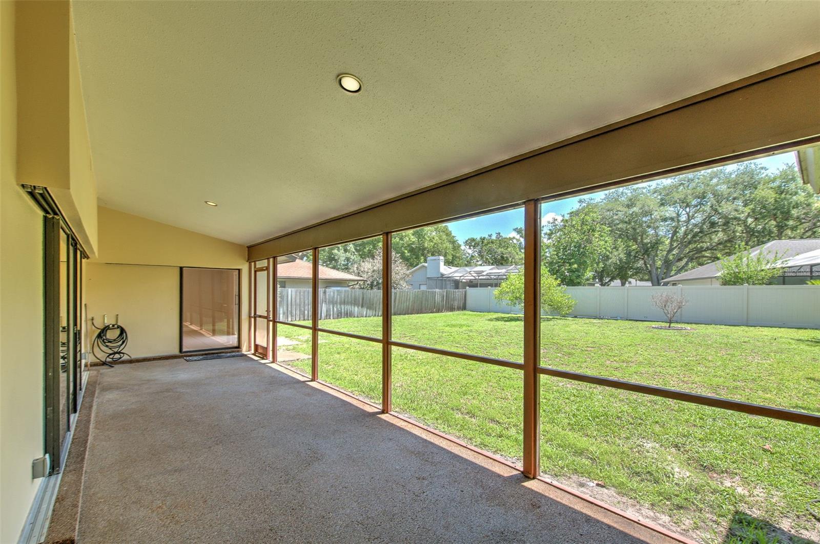Covered Screened Patio with HUGE backyard with Starfruit & Avocado Tree