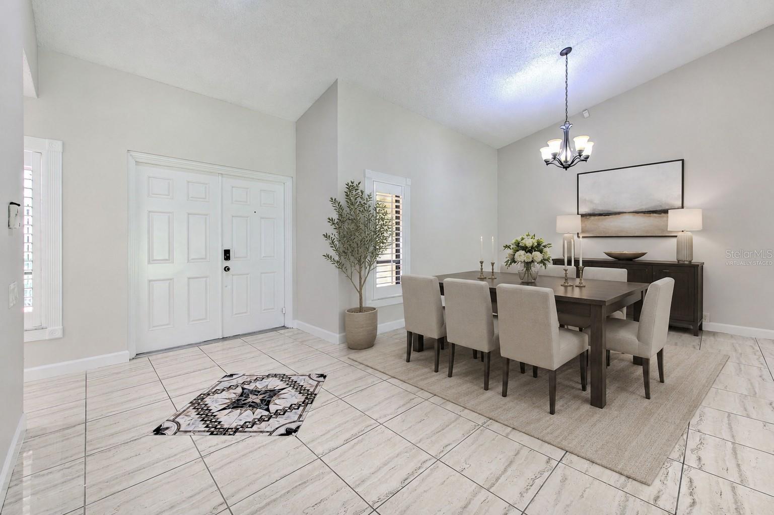 Virtually Staged Dining Room near Foyer