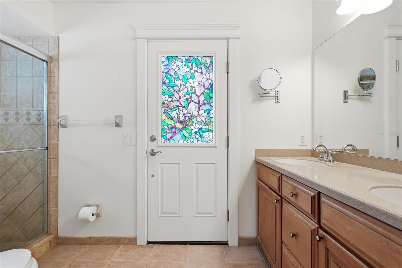 Master bath with access to the pool area