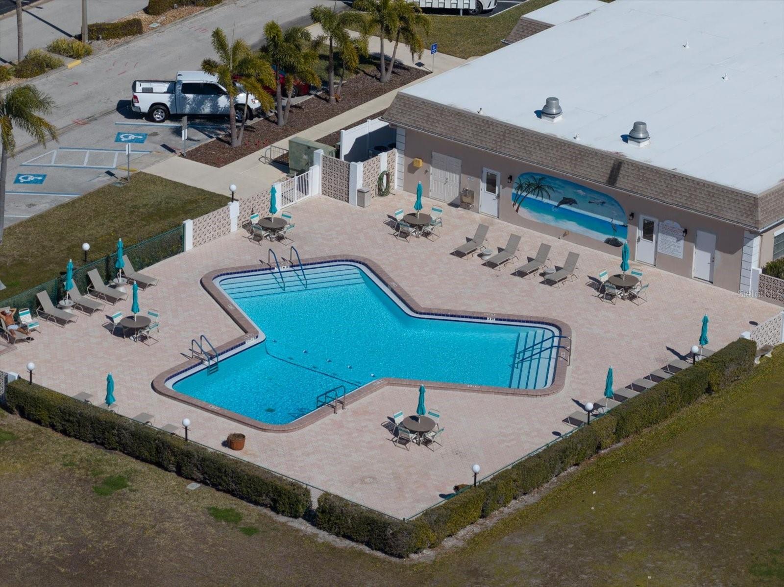 Large heated pool, restroom facilities, sauna, and an ideal space for relaxing and socializing with neighbors.