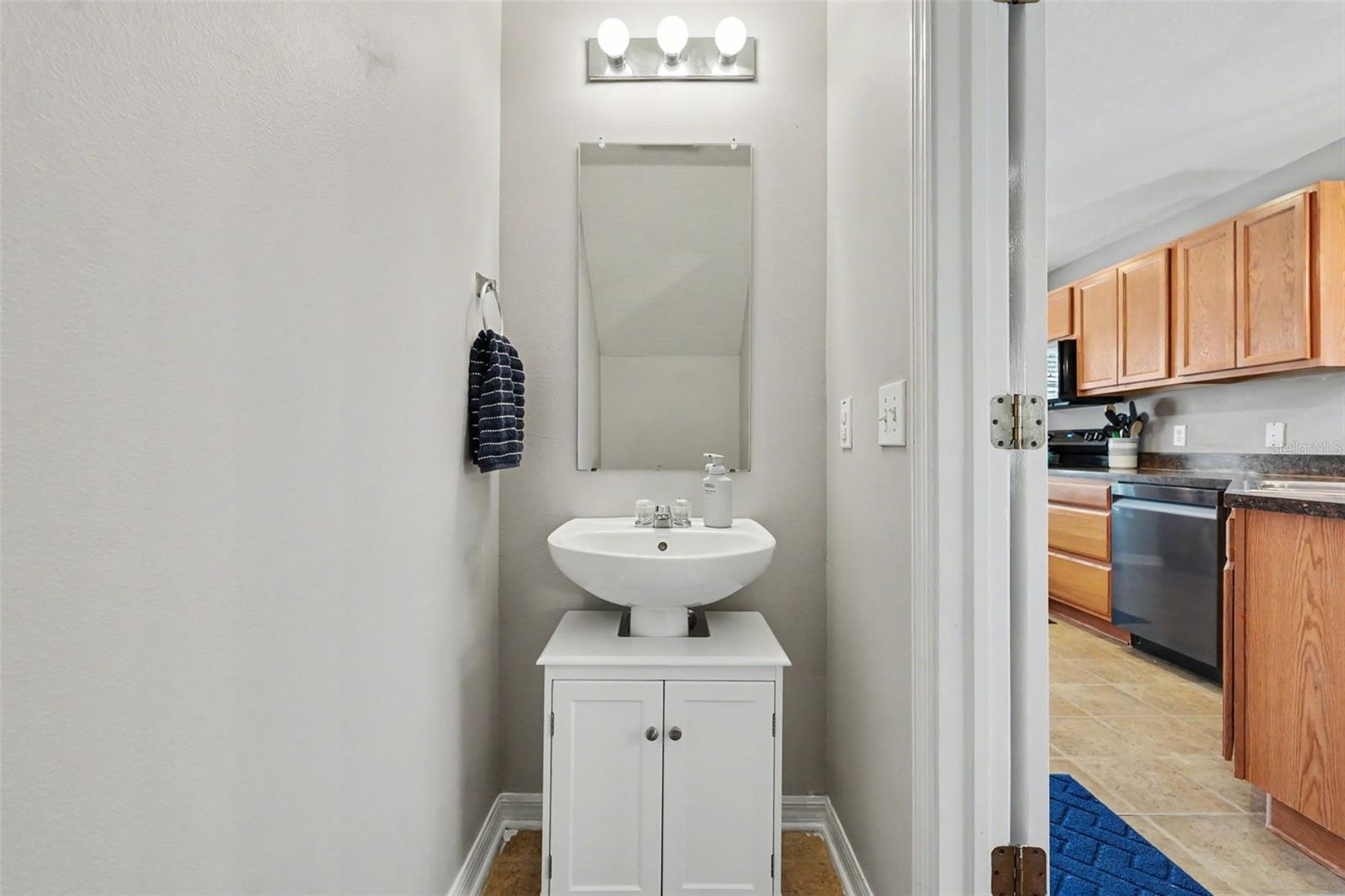 Half bathroom off of the living room