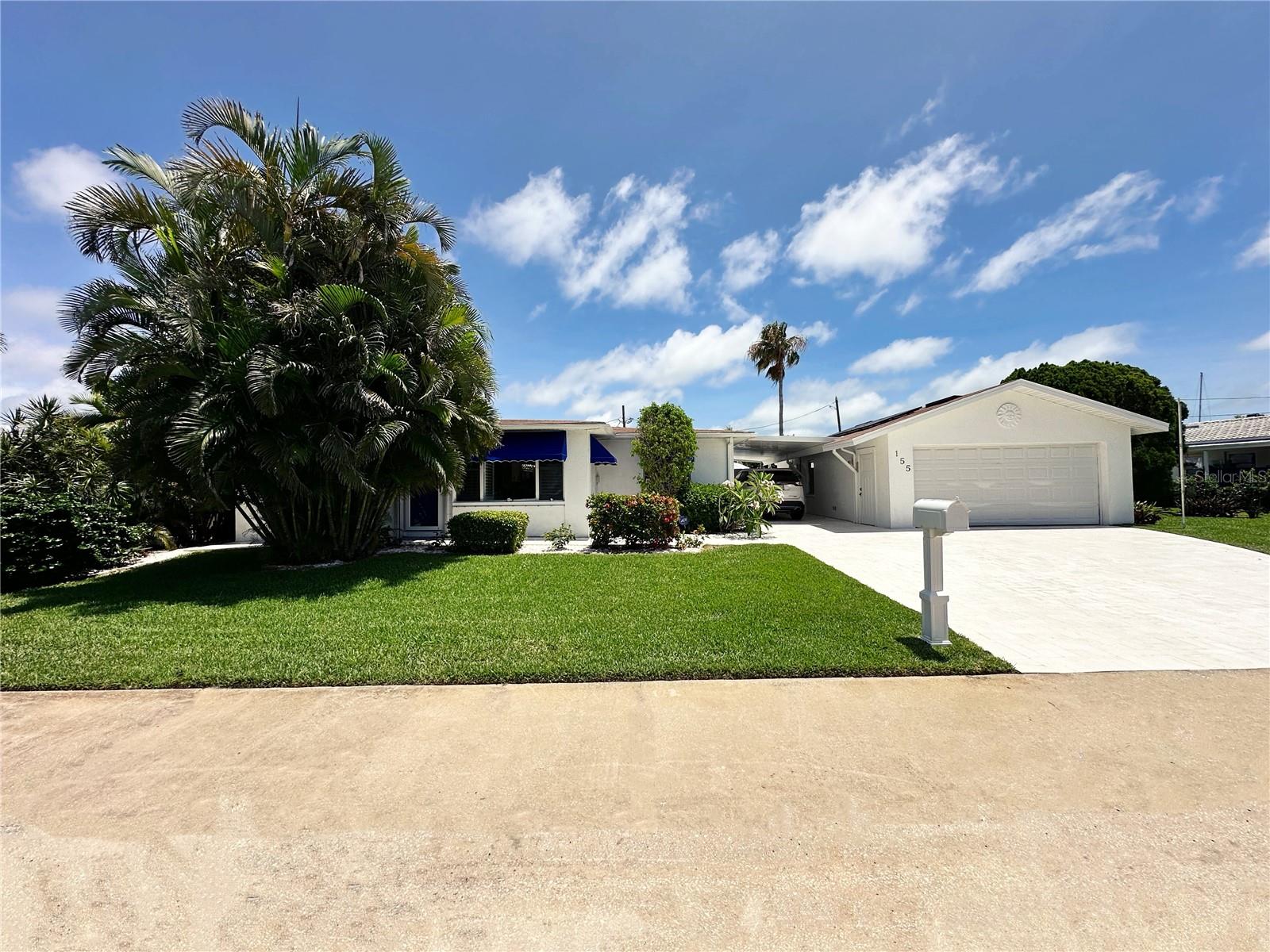 Two stall garage and a carport