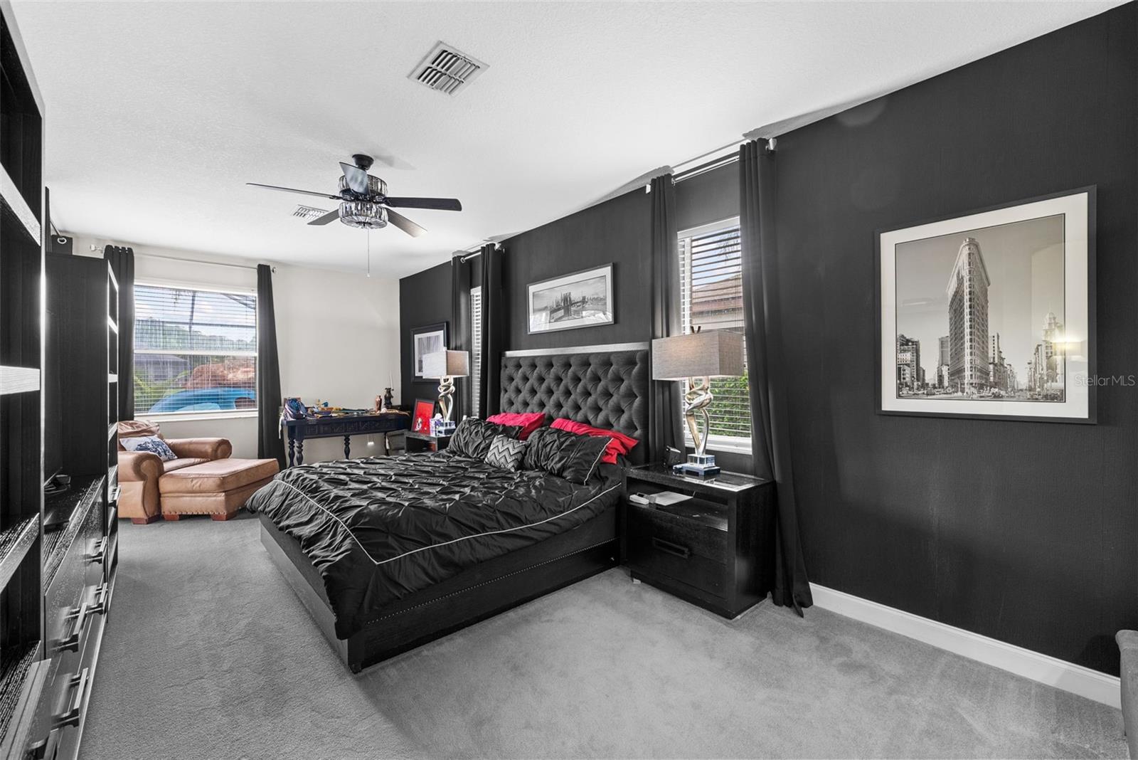 Expansive primary suite with a dramatic, comfortable feel.
