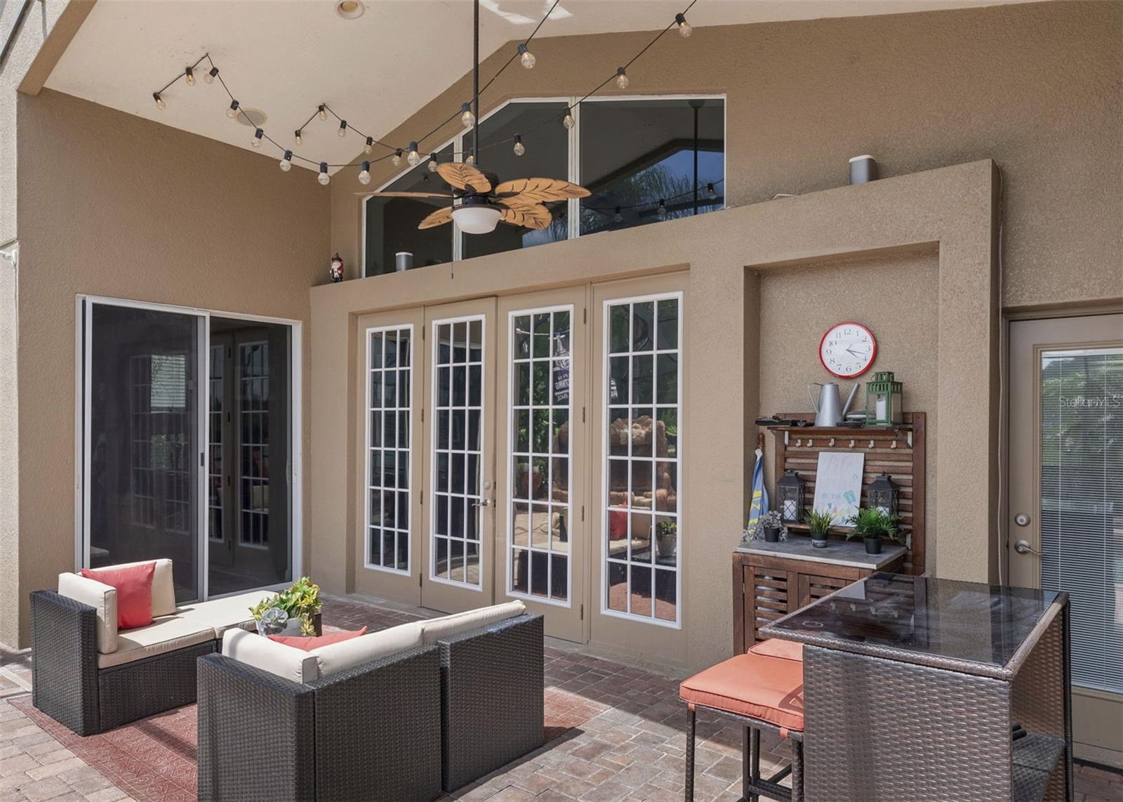 Covered lanai with room to relax, dine, and entertain.