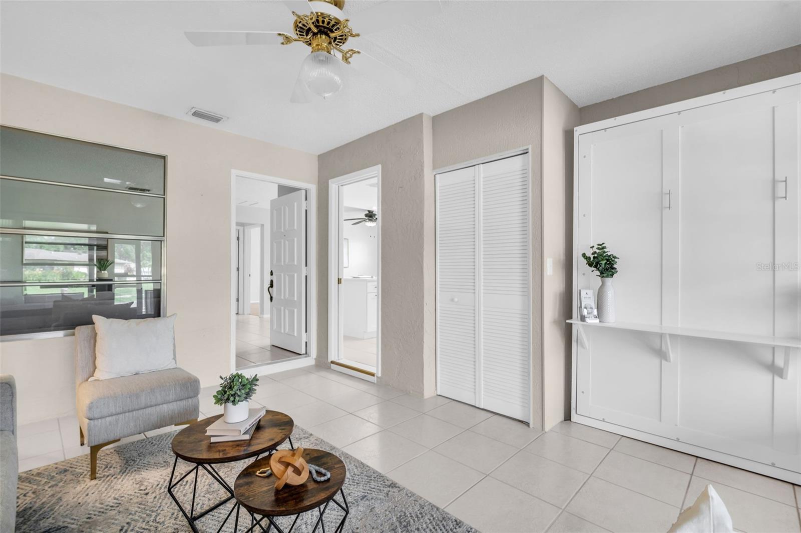 Serves as a 3rd bedroom with a built-in closet & comfy murphy bed~