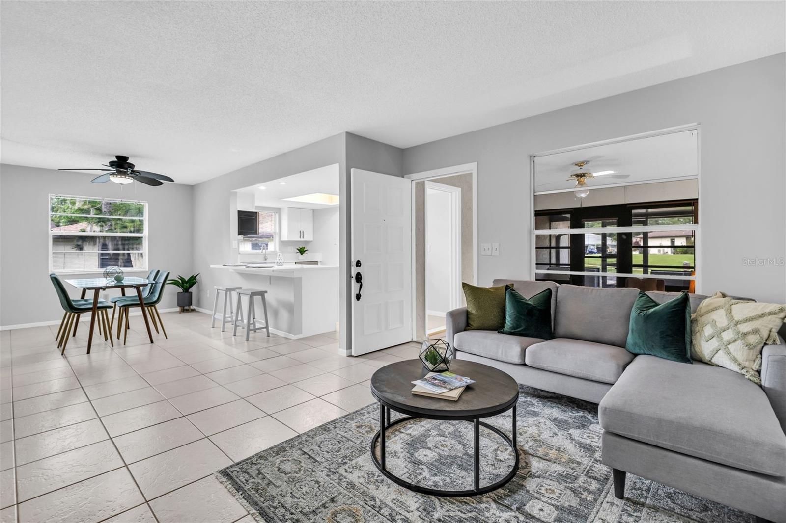 Gracious front entry into the open floor plan for easy living~