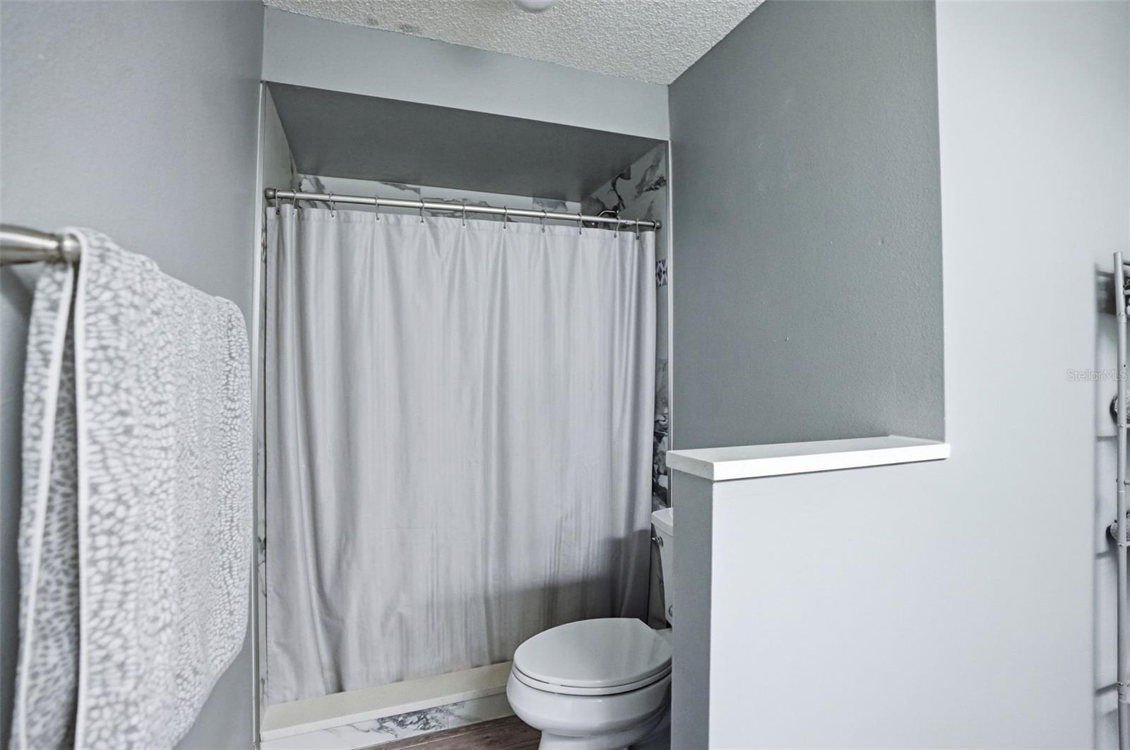 Master shower - remodeled with ceramic tile.