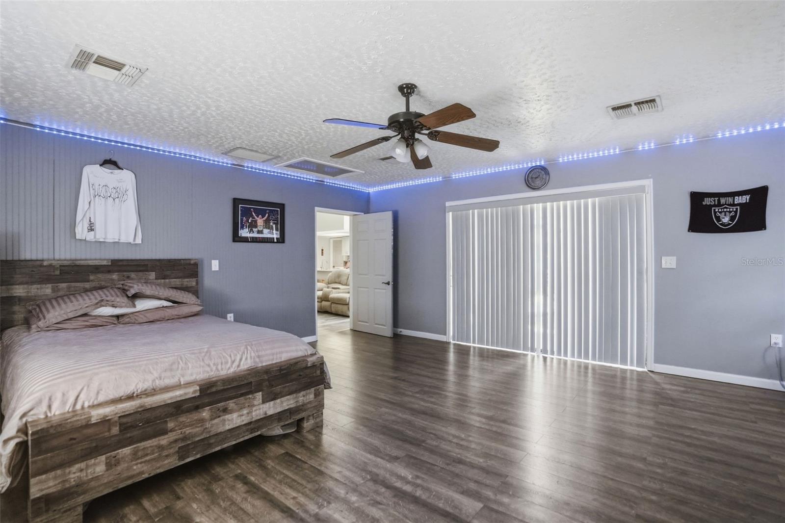 Large bonus room with glass sliders to the pool.