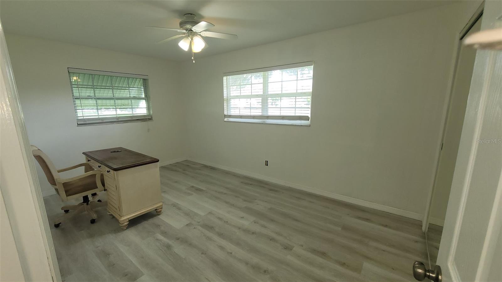10X15 Primary Bedroom. The desk will be removed shortly.