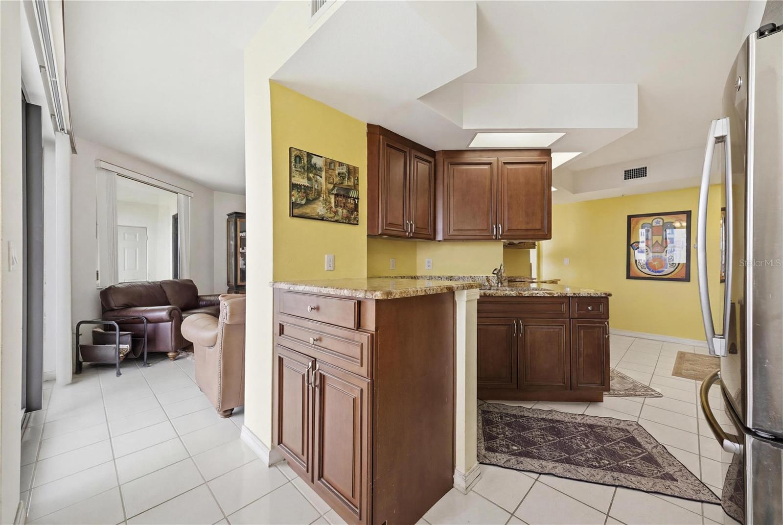 Wonderful flow from the kitchen to the Living room and balcony