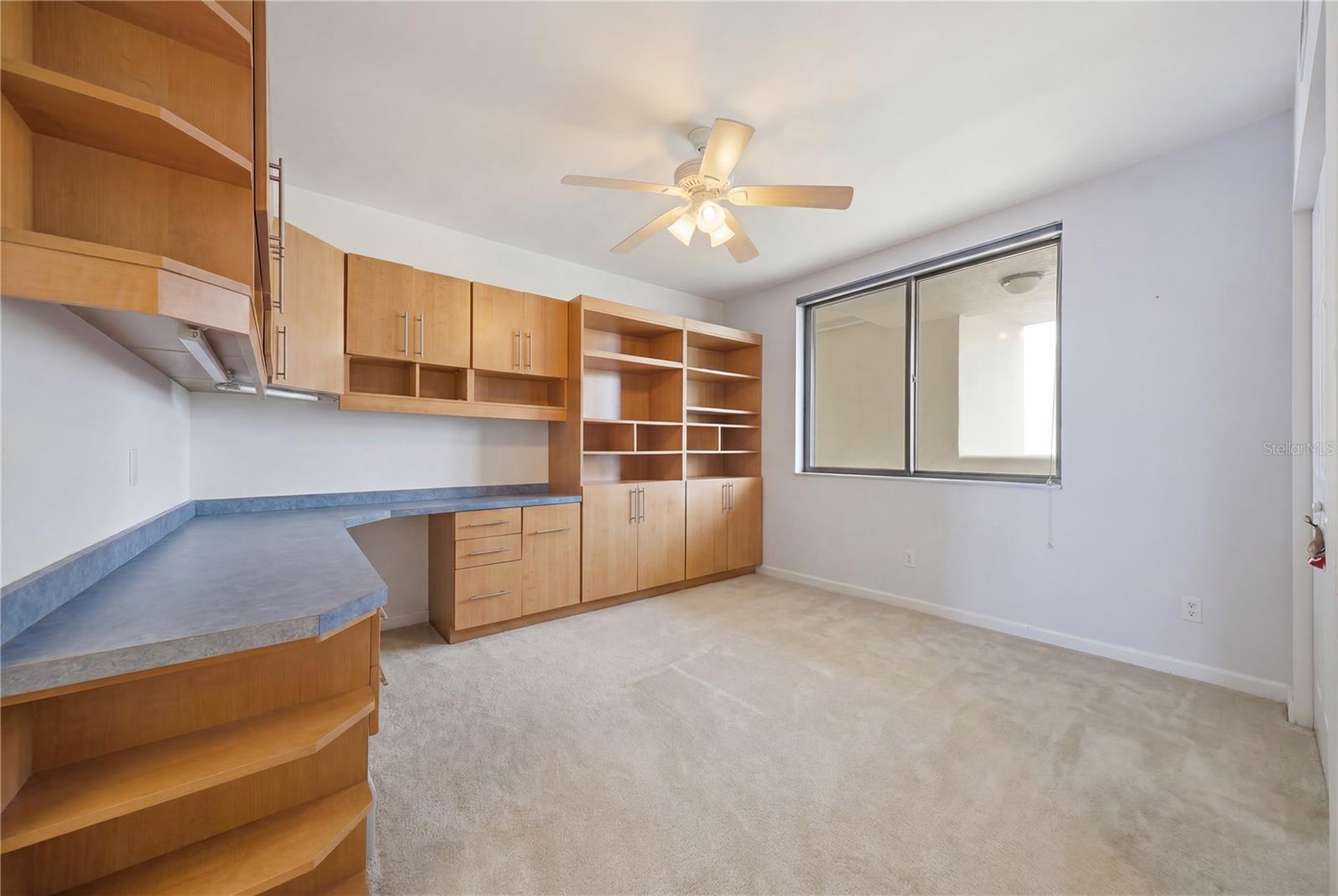 Bedroom #2 with built-in shelving