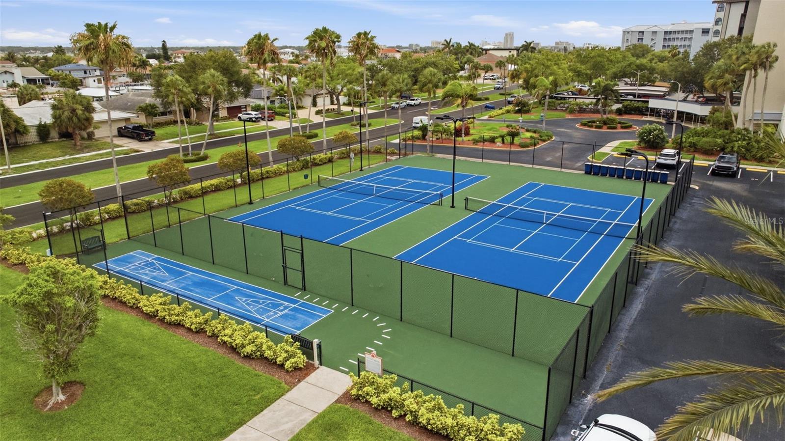 two tennis courts and pickleball courts