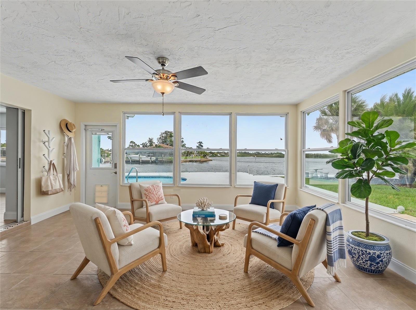 Florida Room with stunning views of the canal and partial Gulf