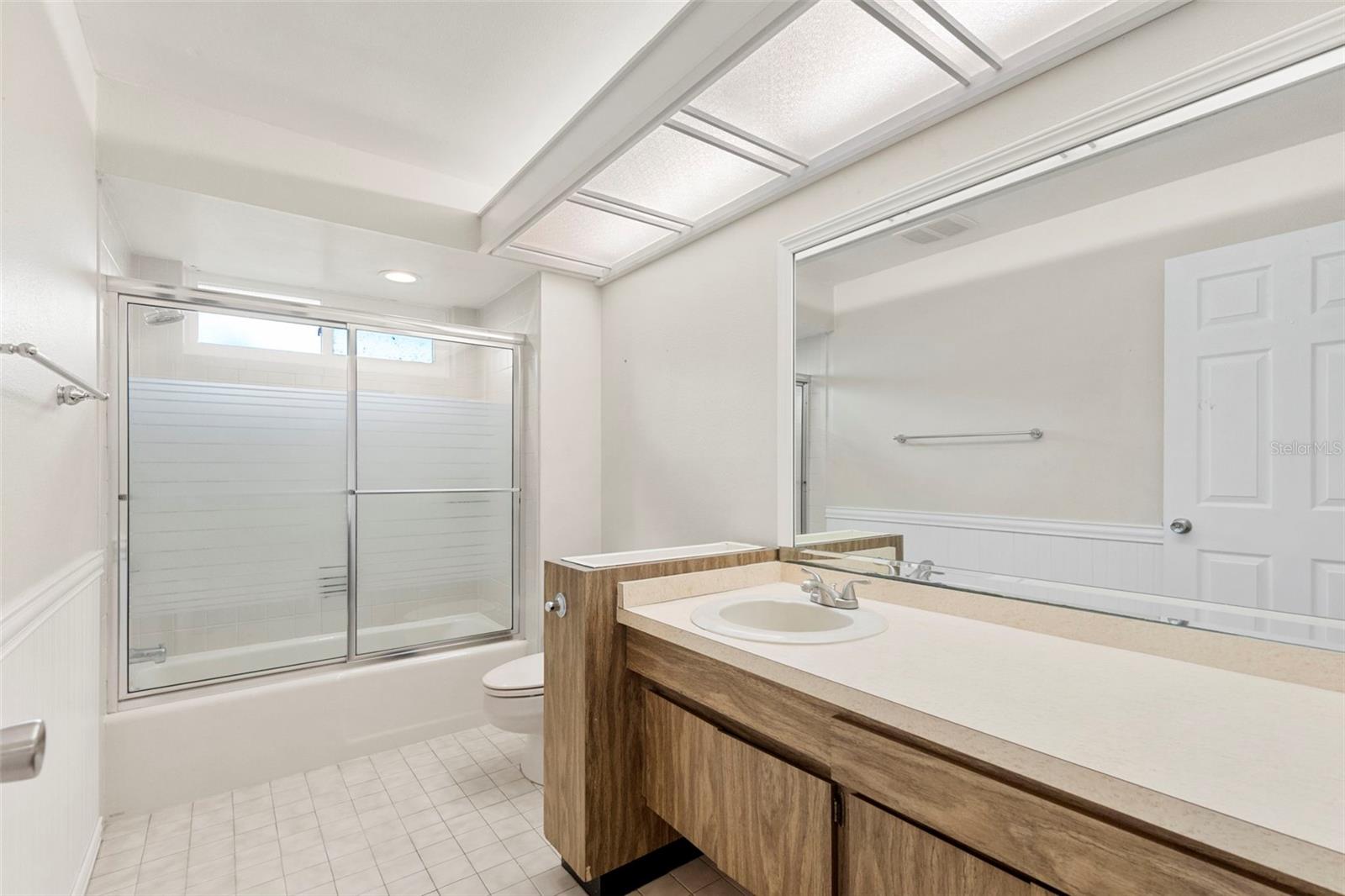 Full bath between situated between bedrooms 2 and 3
