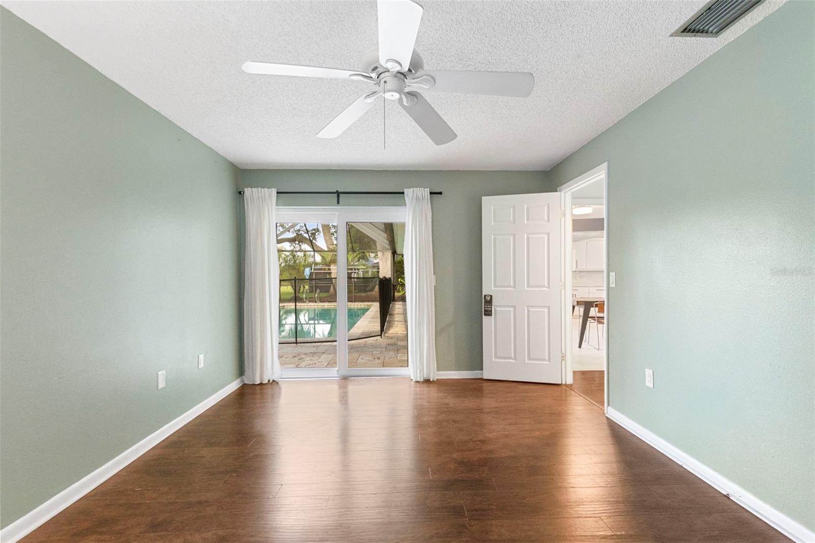Bedroom 3 has access to screened in patio