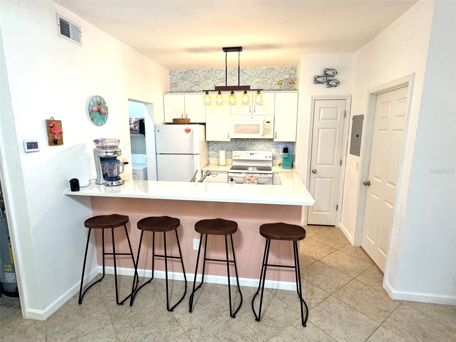 Open kitchen with breakfast bar