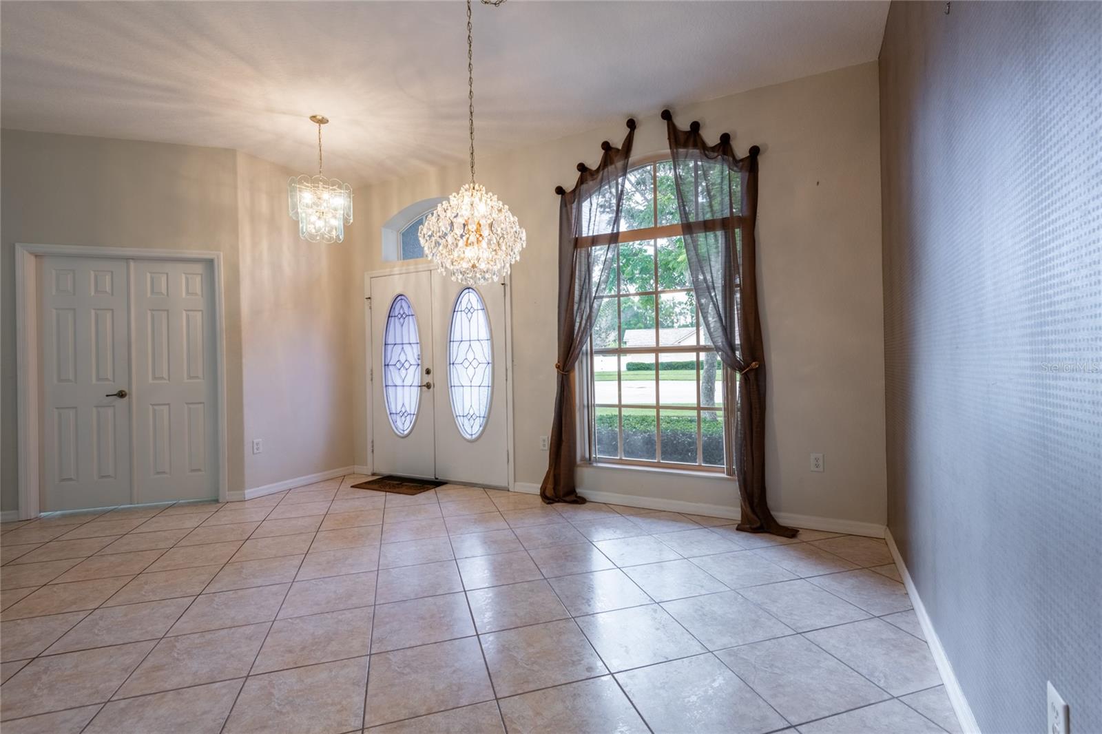 LOOKING INTO DINING AREA AND OFFICE