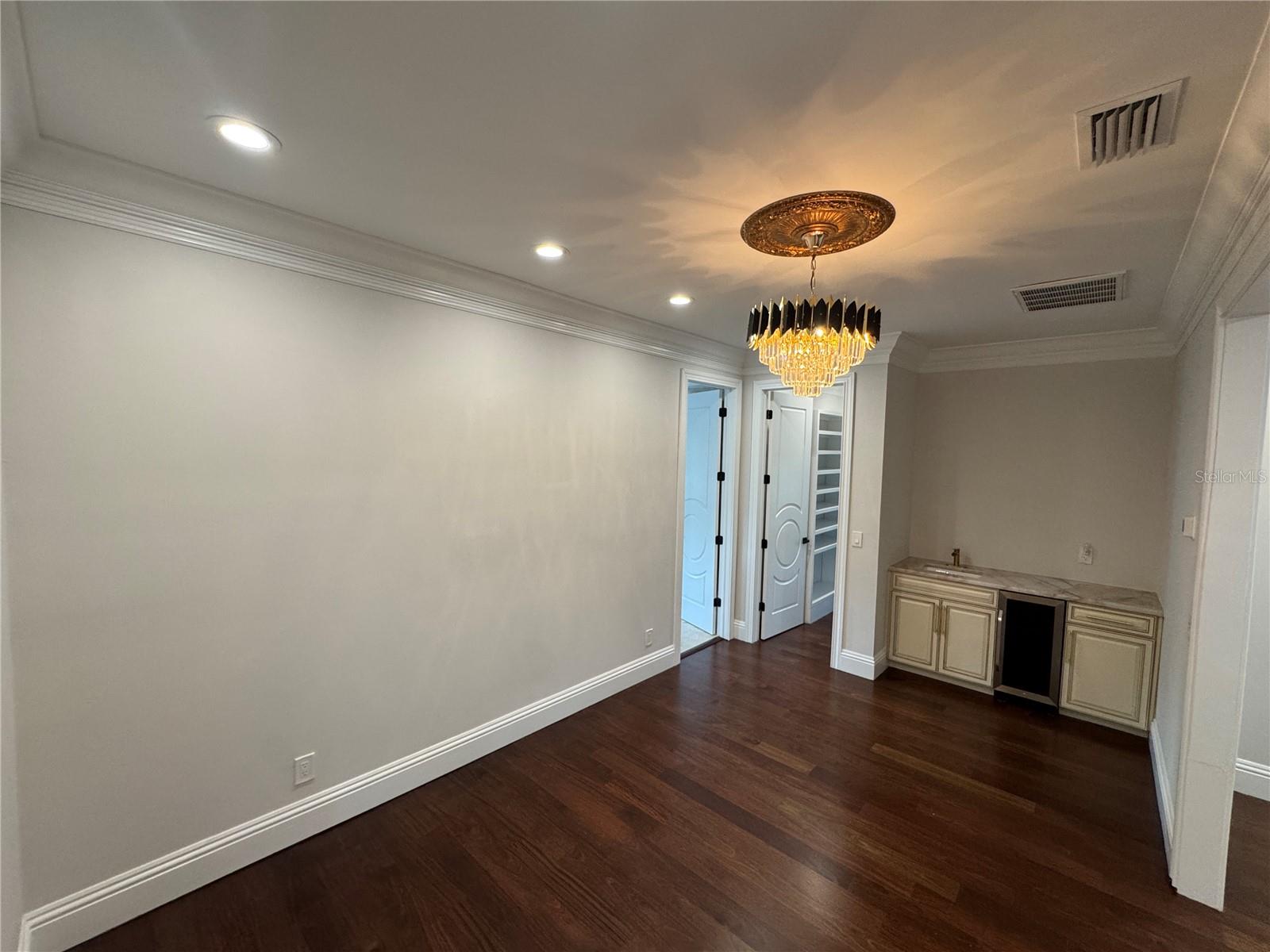 Primary Sitting Room with Wet Bar
