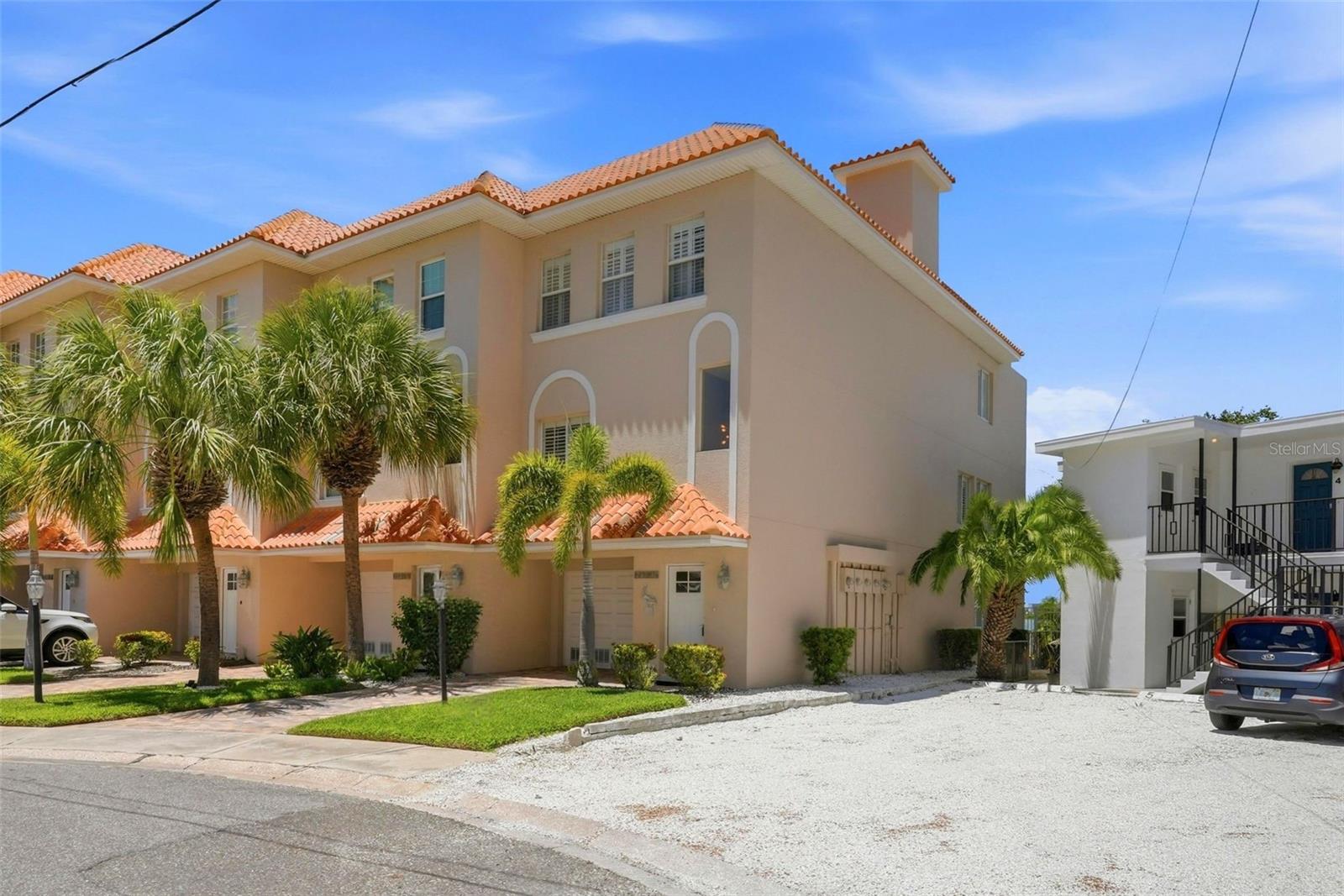 Welcome to this exceptional waterfront corner-unit townhome, offering 3B/3B - three levels with sweeping water views from every floor.  It features an elevator, an assigned 30ft deepwater boat slip with a 10,000-pound lift, a rooftop terrace, climate-controlled bonus room on ground level, and a low monthly maintenance fee of $592.