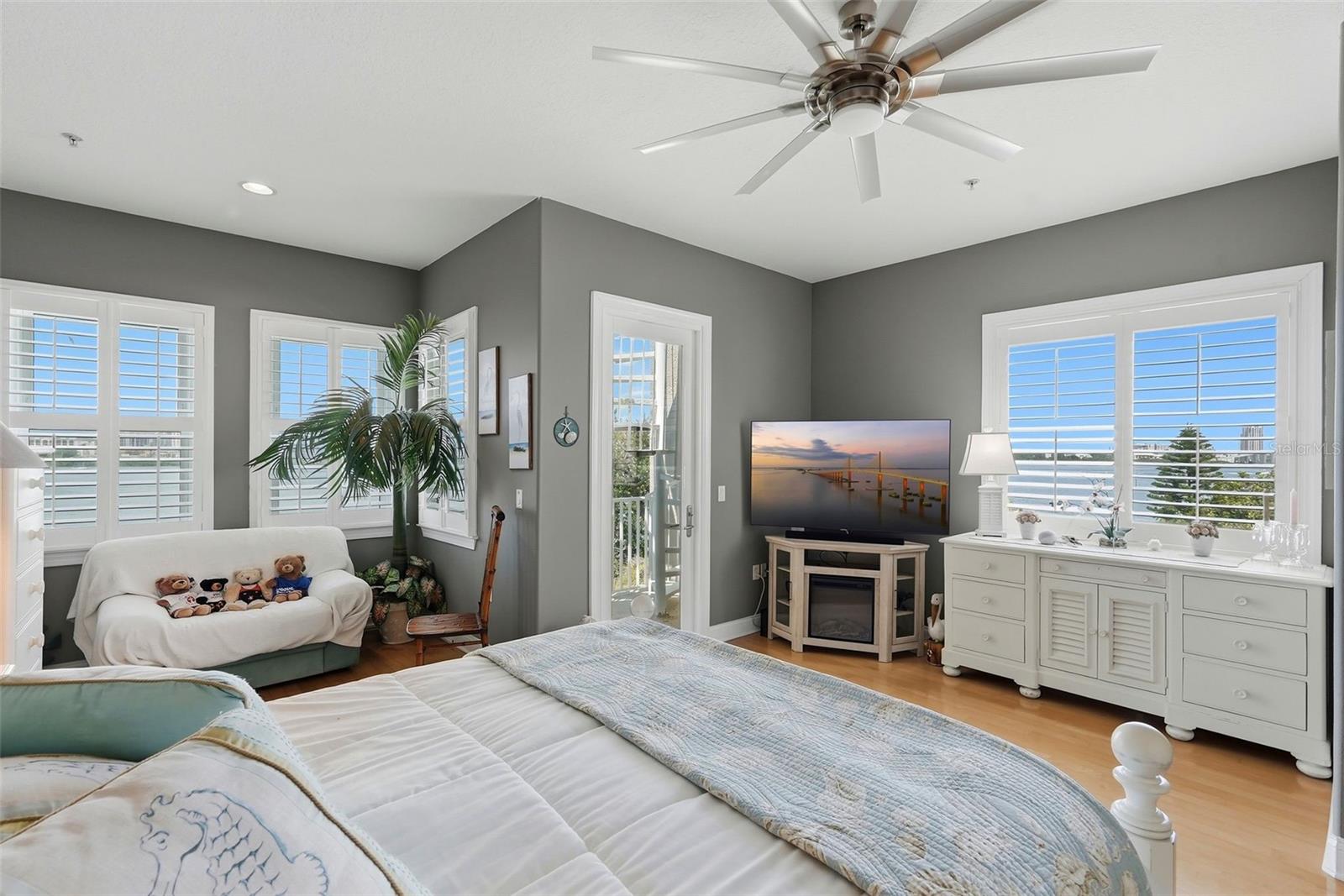 A most charming seaside master! Spiral stairway leads to rooftop terrace.