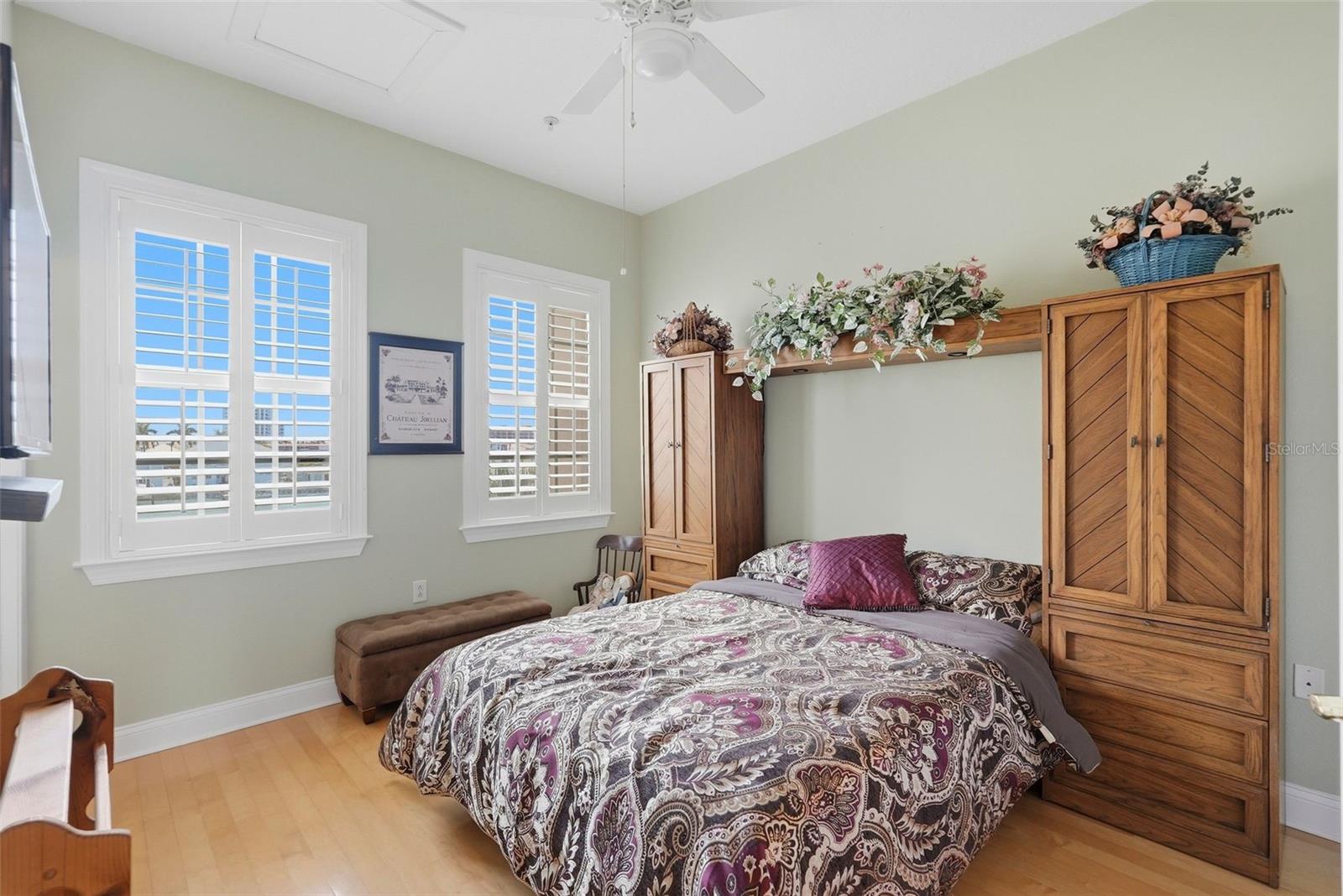 3rd level guest room with plantation shutters.