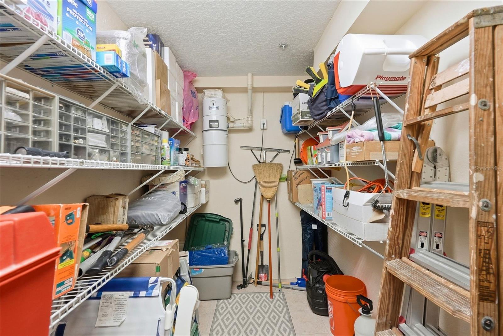This is the extra storage room the owners made by putting up a wall in the garage.  The wall can be removed to convert back to a 2 car tandem garage.