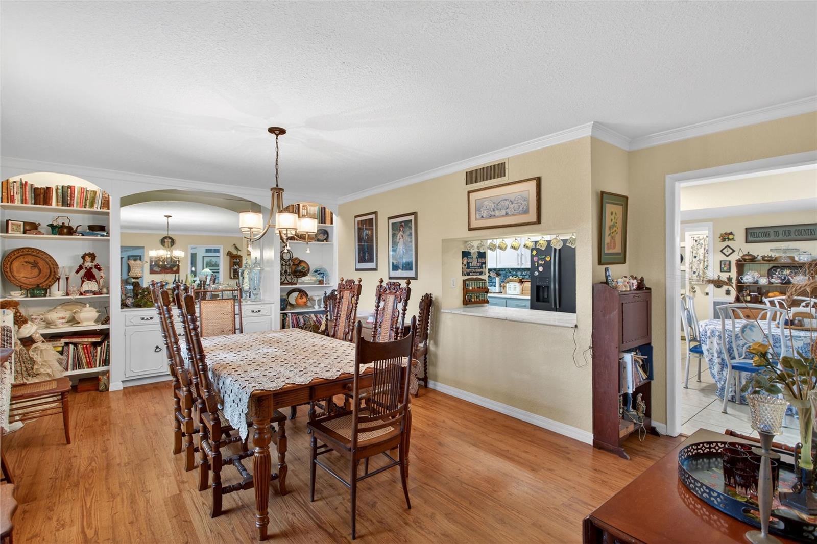 dining room has custom built in hutch and open shelving