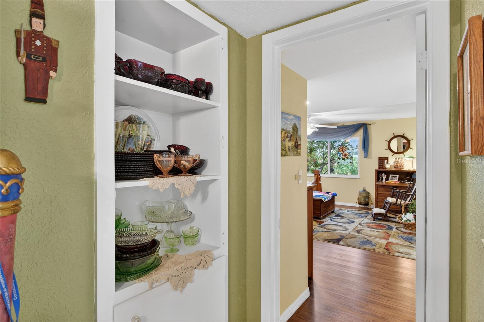 entry shelves and closet at entry of main bedroom