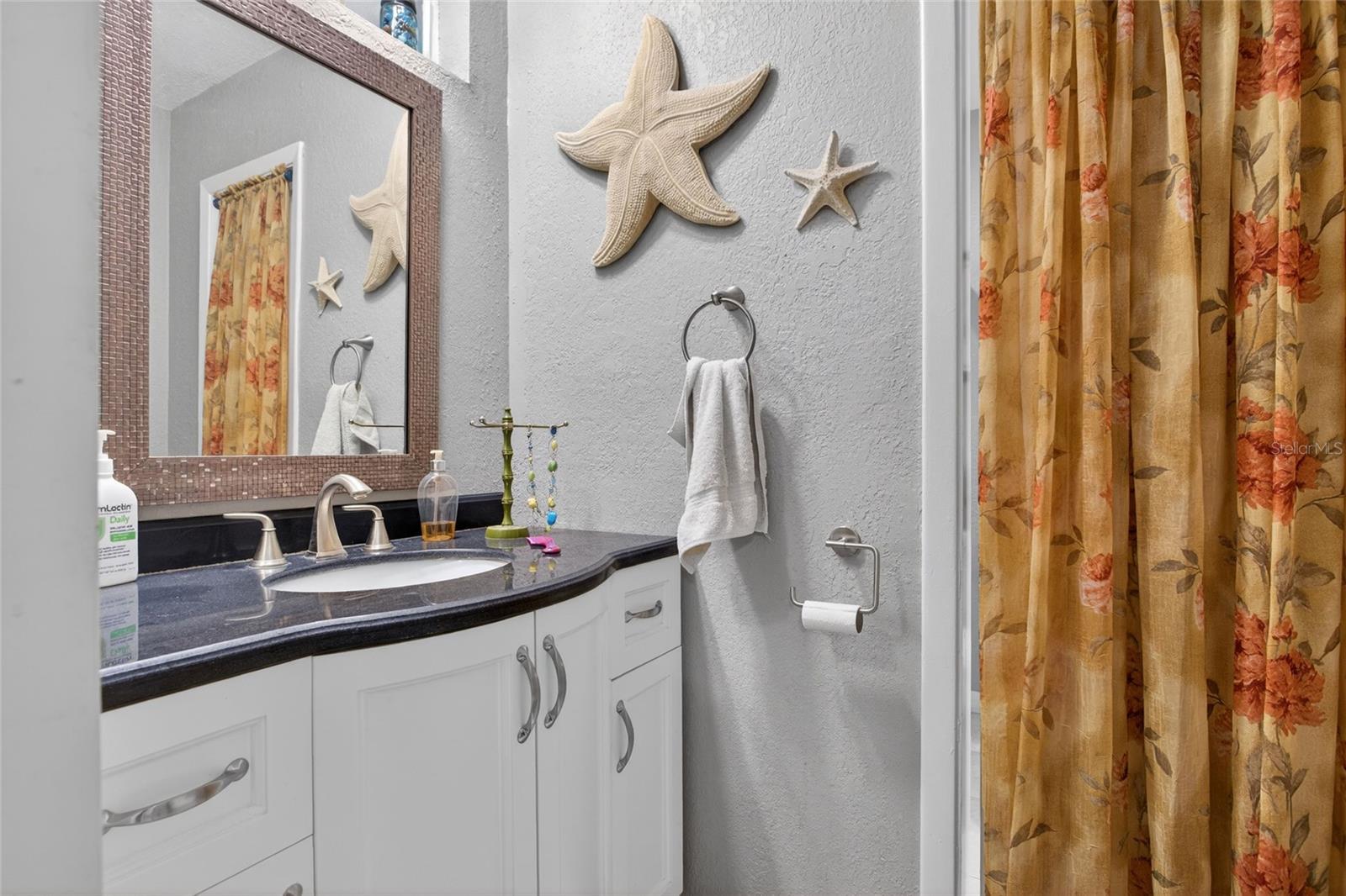 half bath off of bedroom 3 office