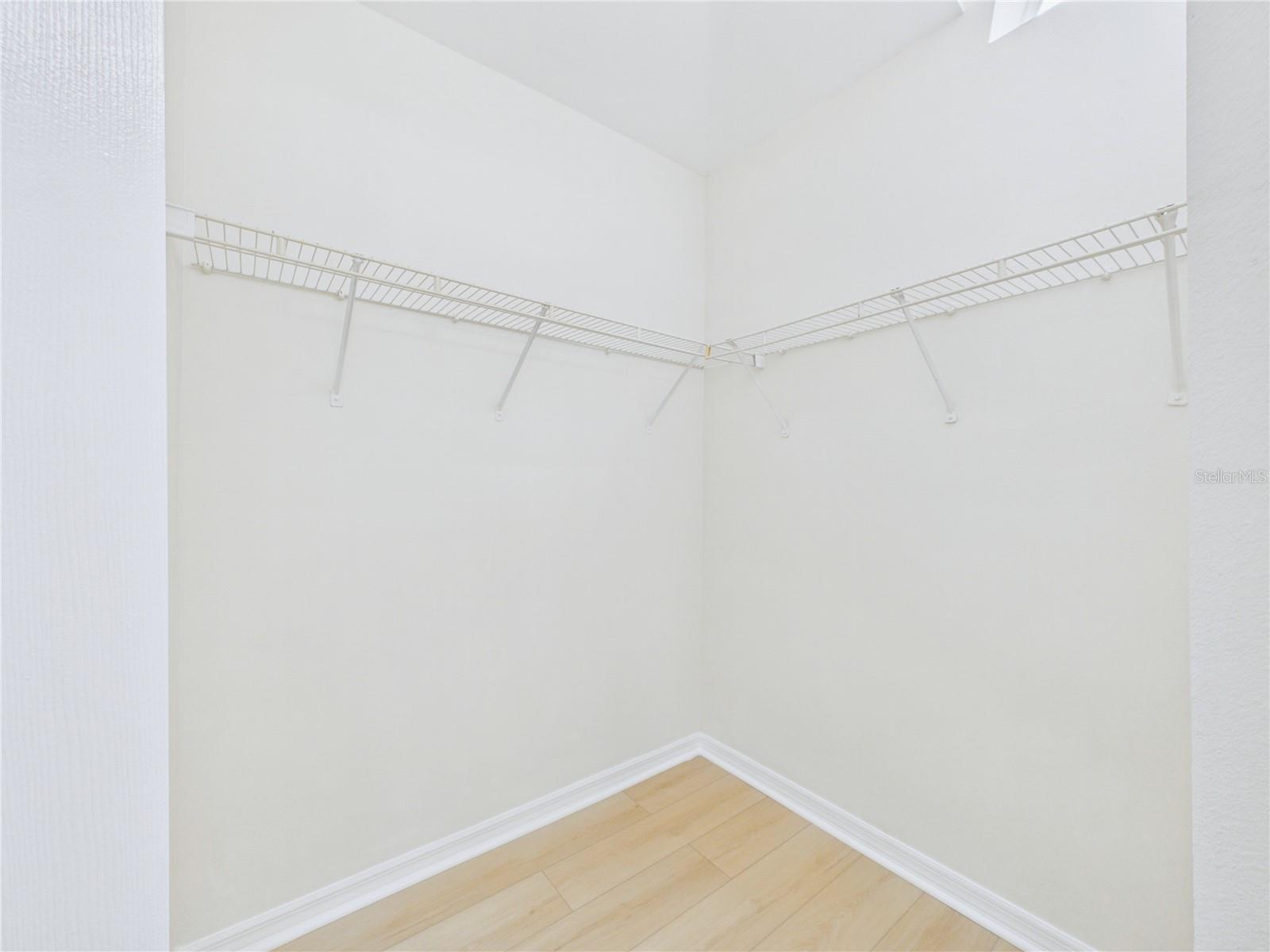 Primary bedroom walk-in Closet