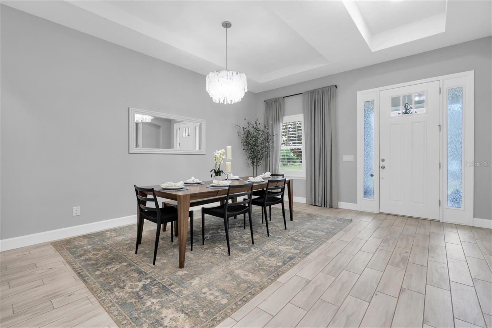 FORMAL DINING ROOM WITH CHANDELIER