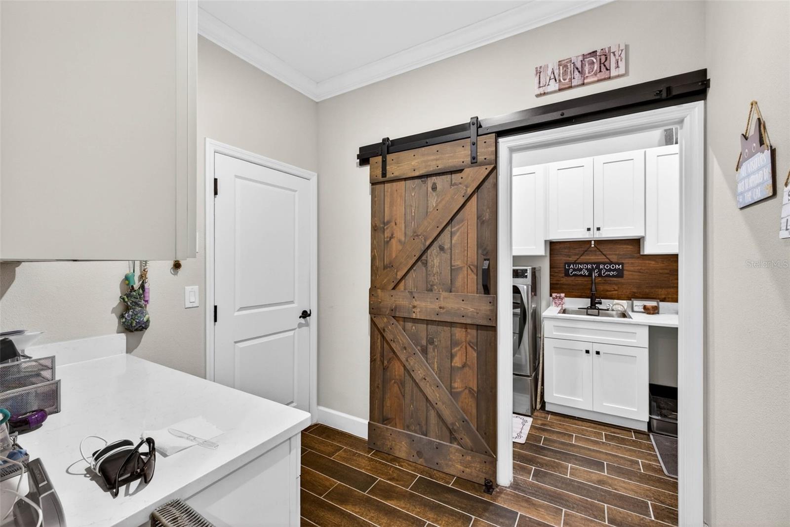 Barn door closet pantry, walk in "catch all" area and laundry