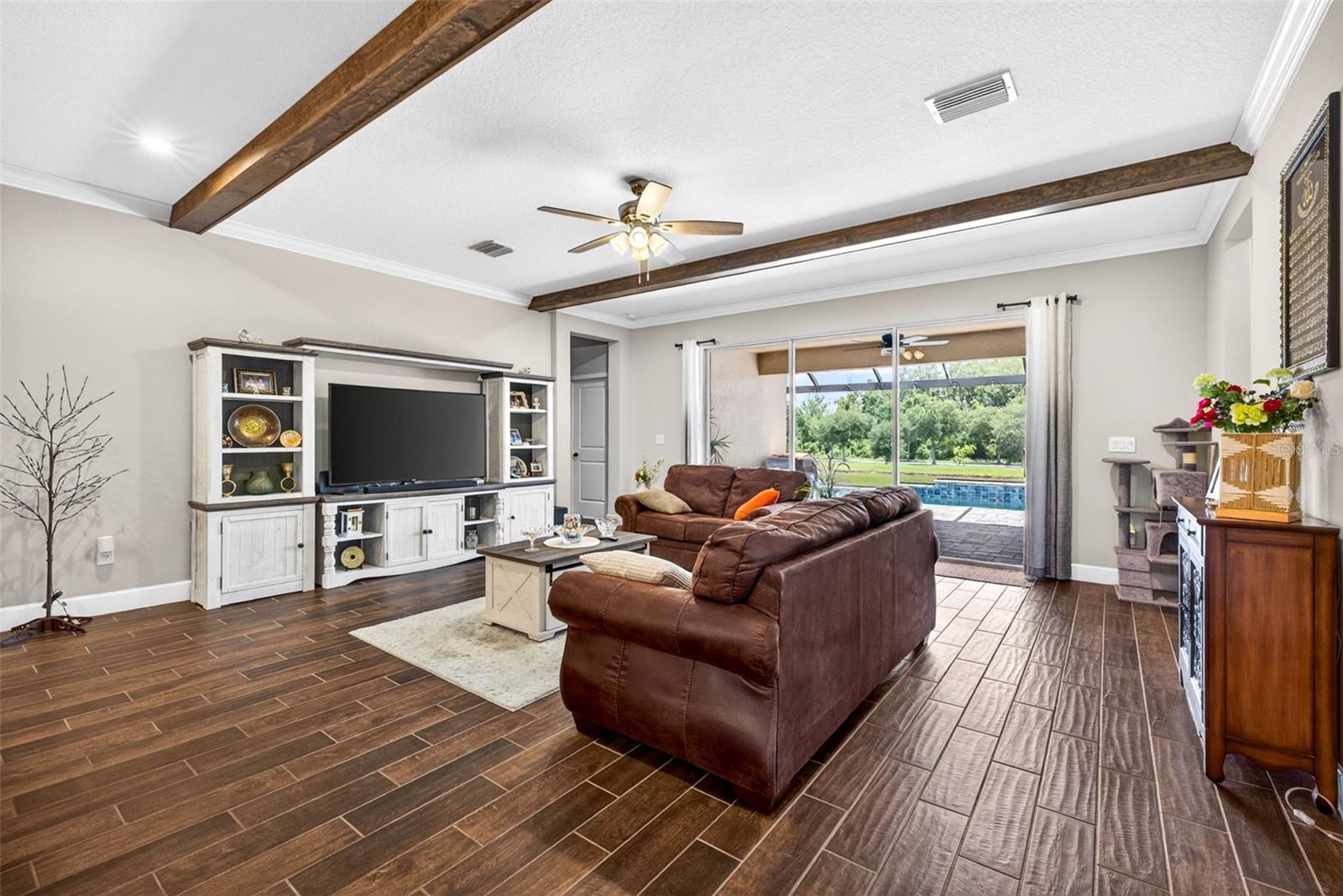 Living room accented with overhead lighting