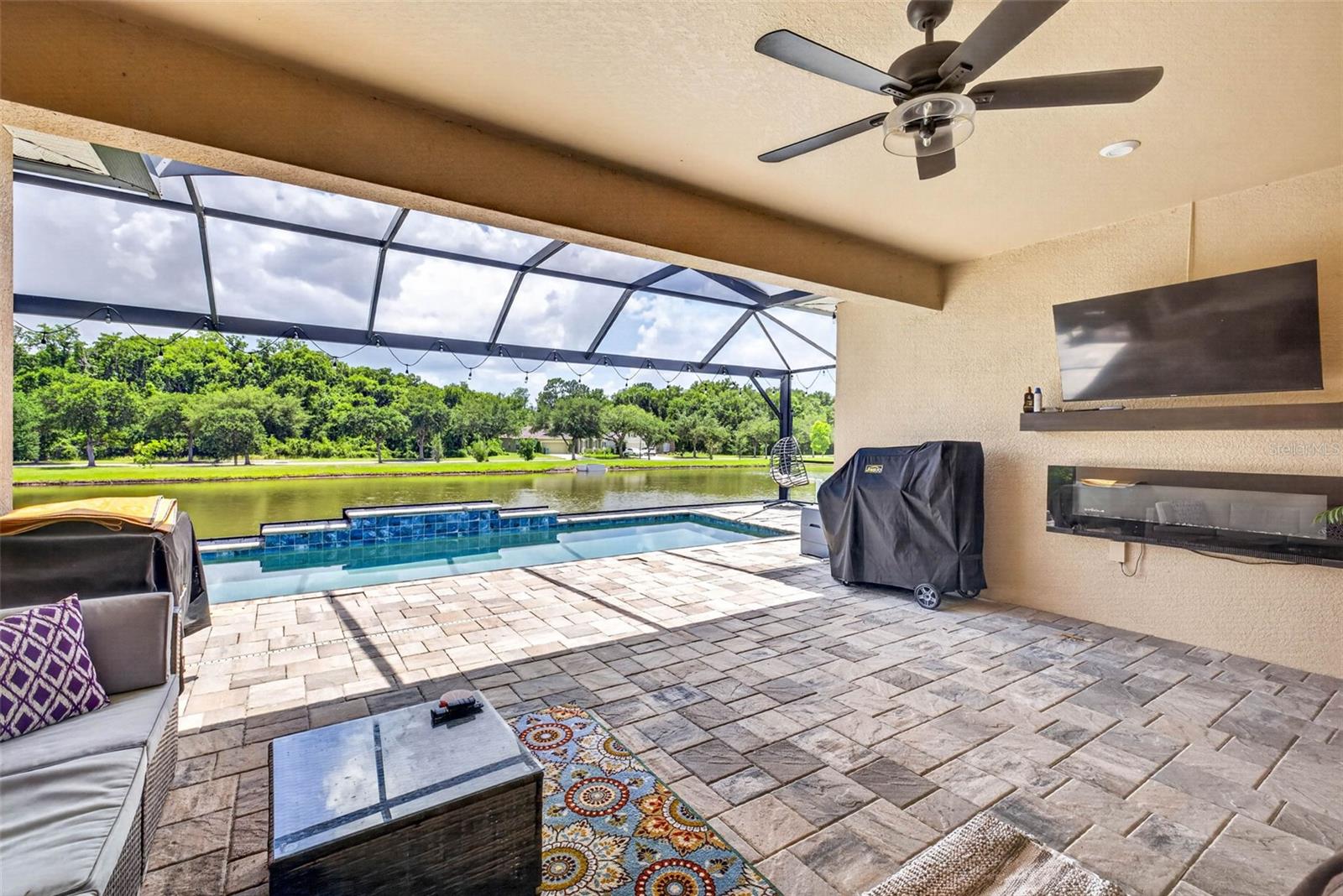 Outdoor electric fireplace and entertaining area
