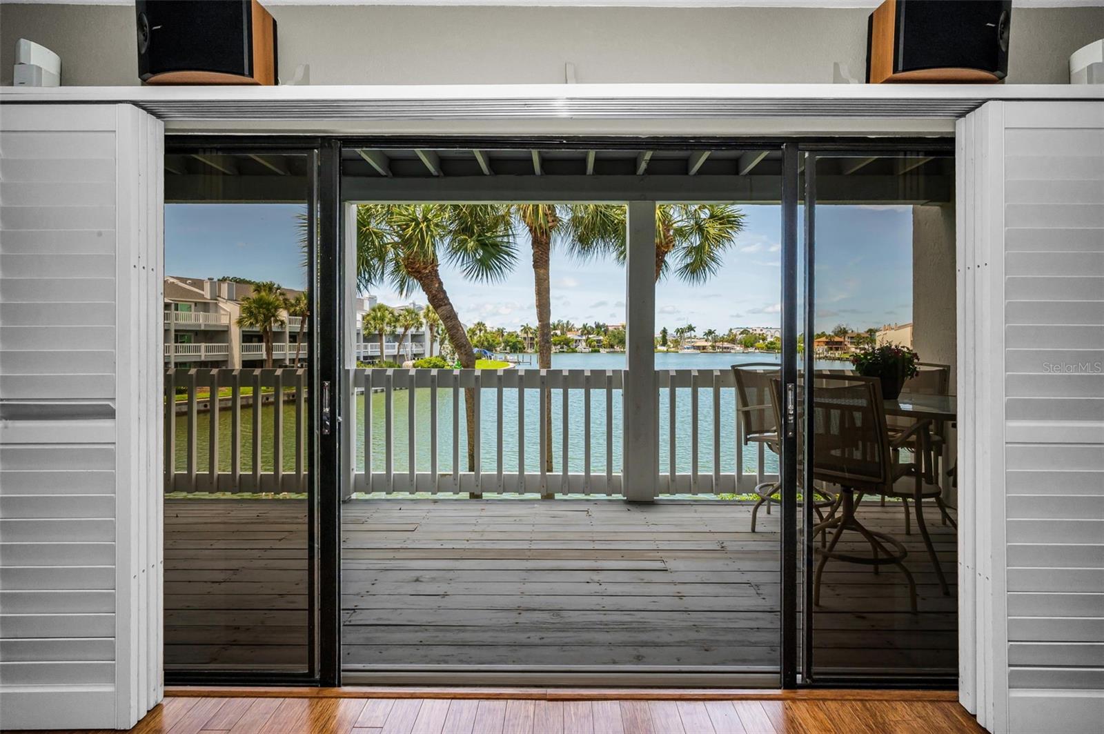 Sliders with plantation shutters to the balcony