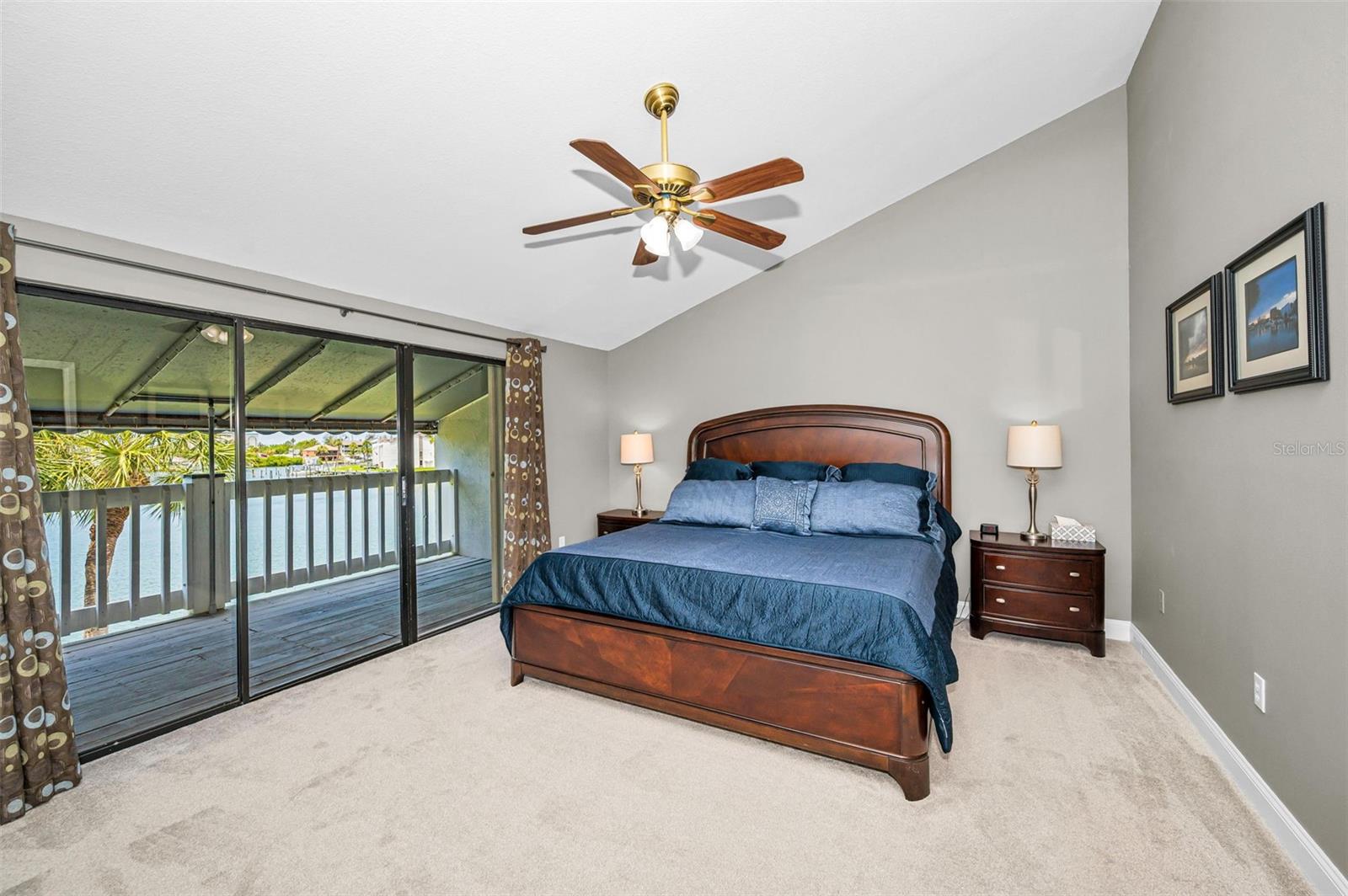 Primary bedroom with sliders to the balcony