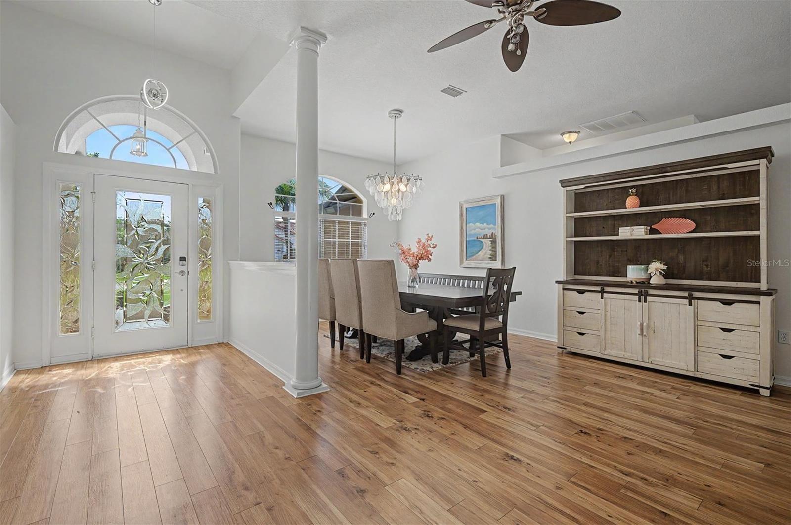 Welcoming entry adjoins dining area
