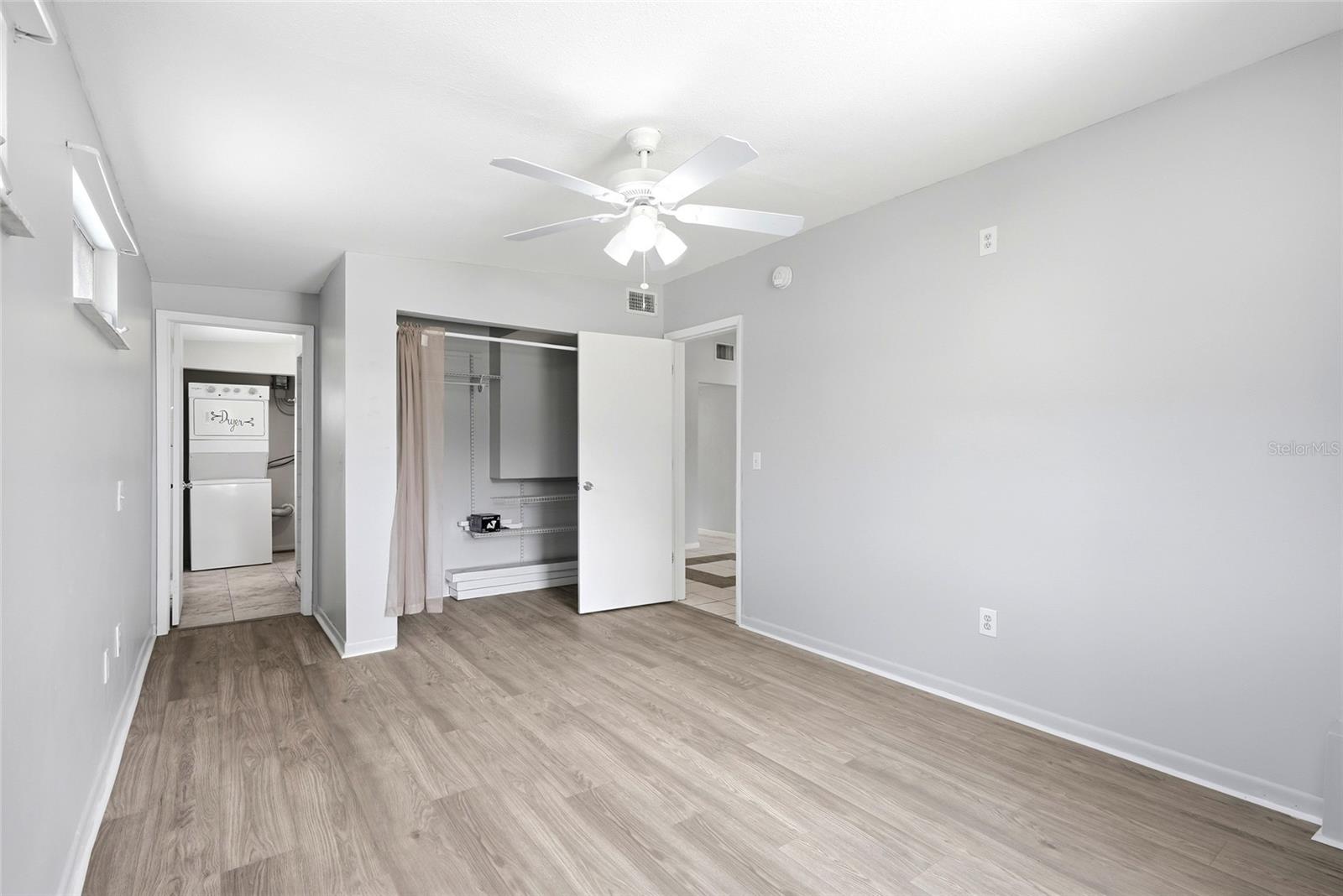 primary bedroom with multiple closets