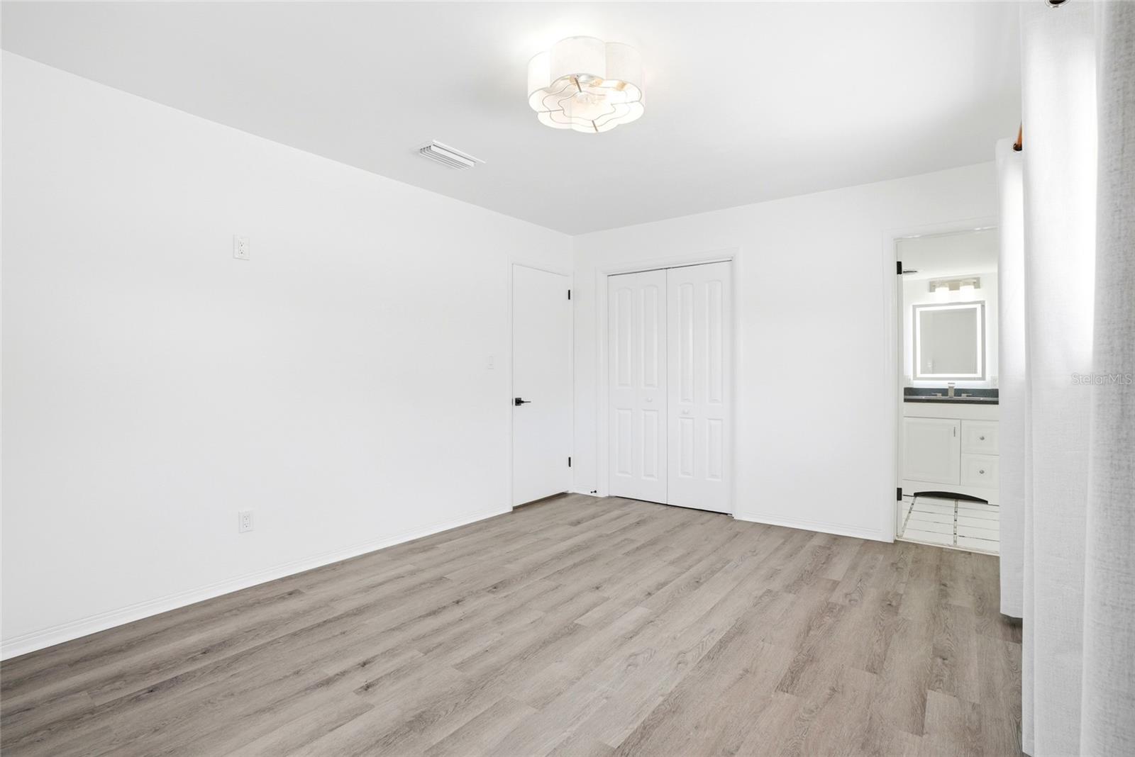 Master bedroom with en-suite bathroom.  This room can accommodate a king size bed suite
