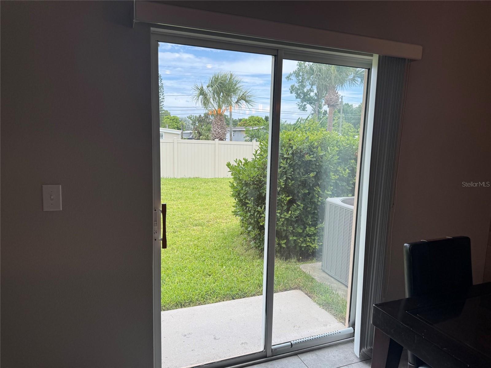 Sliding glass doors to backyard