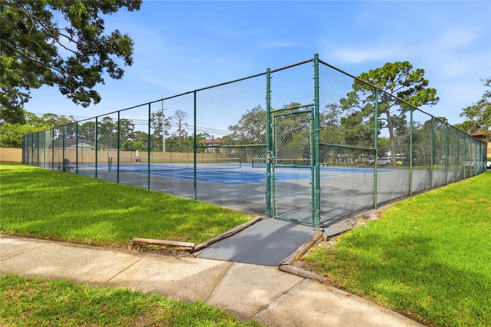 Tennis court and shuffleboard
