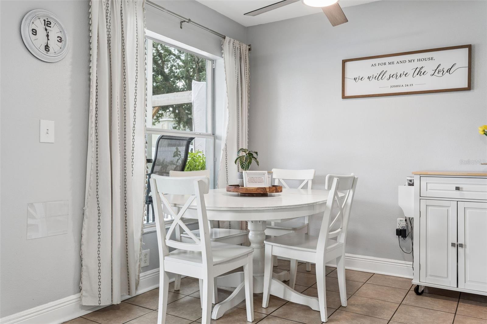 Sit down for a cup of tea while enjoying your view of the private backyard.