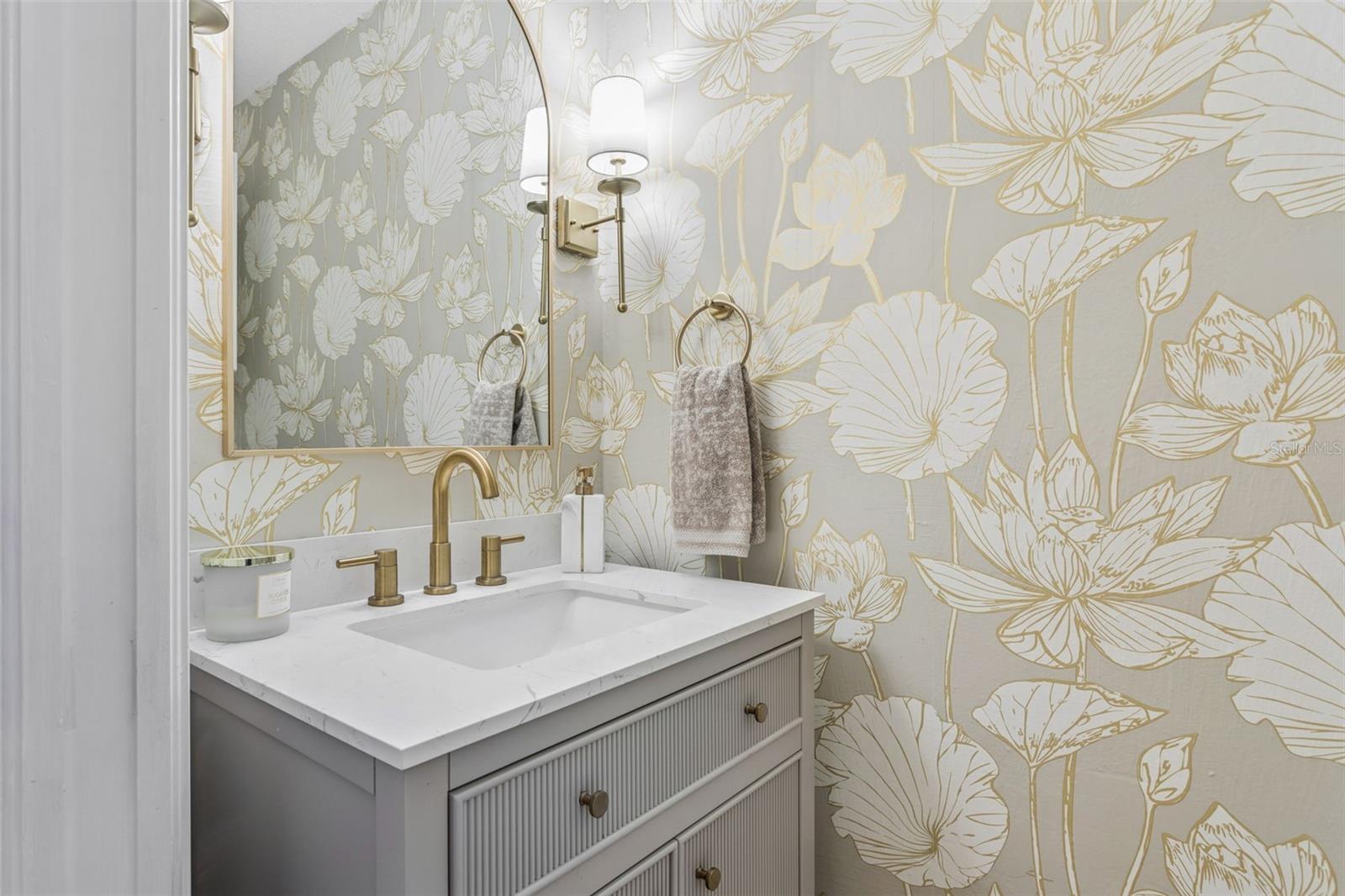 Your half bath is tastefully finished with touch of elegance.