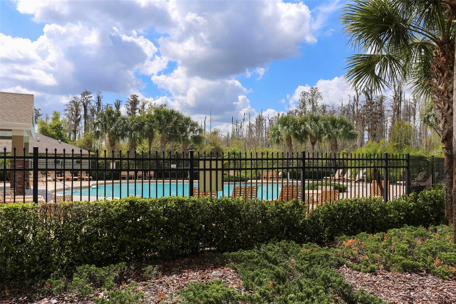 Enjoy your community pool within walking distance from your home