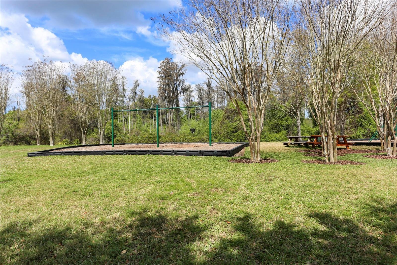 Sand volley ball and picnic tables to enjoy your lunch or cold beverage.