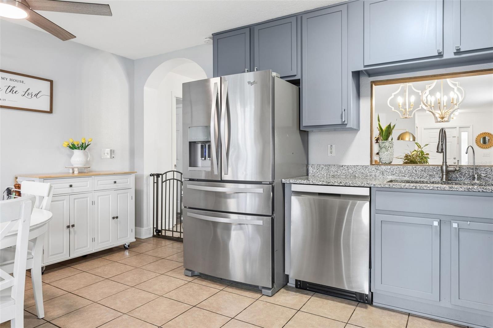 Kitchen large enough to have a dinnette set.  Beautiful Grey Wood Cabinets.  Top of the line new stainless steel appliances.